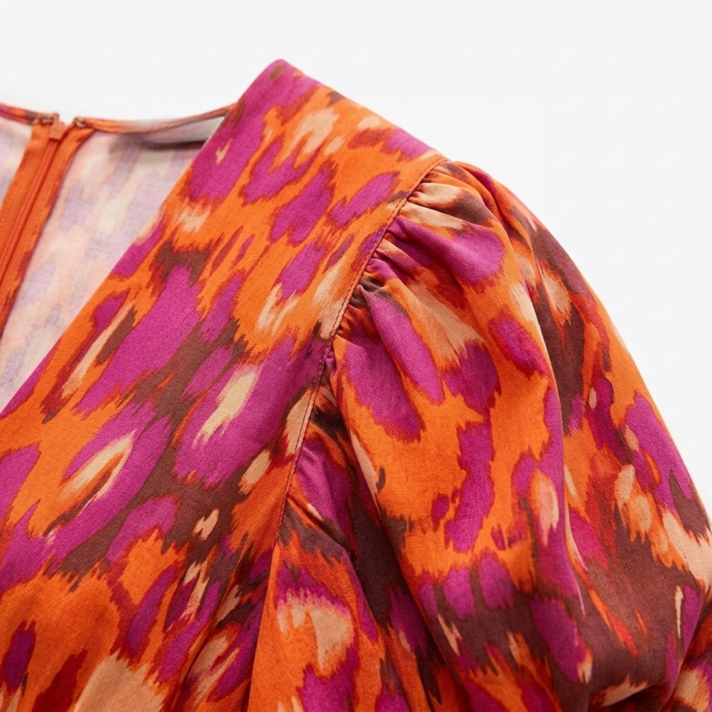Robe longue imprimée — col en v et manches volume — fête